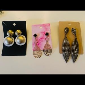 Three earrings brand new